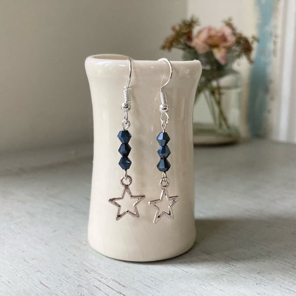 Star earrings with black sparkle beads