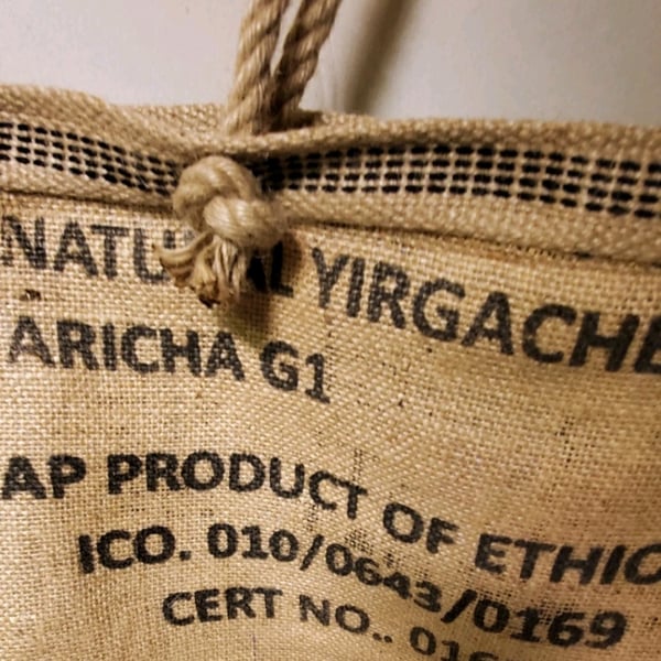 Upcycled jute coffee sack tote bag.