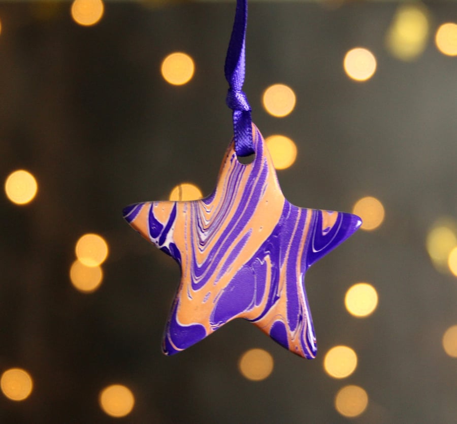 Purple and coral marbled ceramic star decoration  