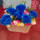 Artificial Flowers set in wicker basket