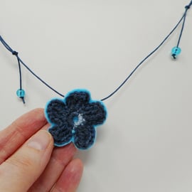 Pretty blossom flower necklace in blue, perfect for a beach holiday