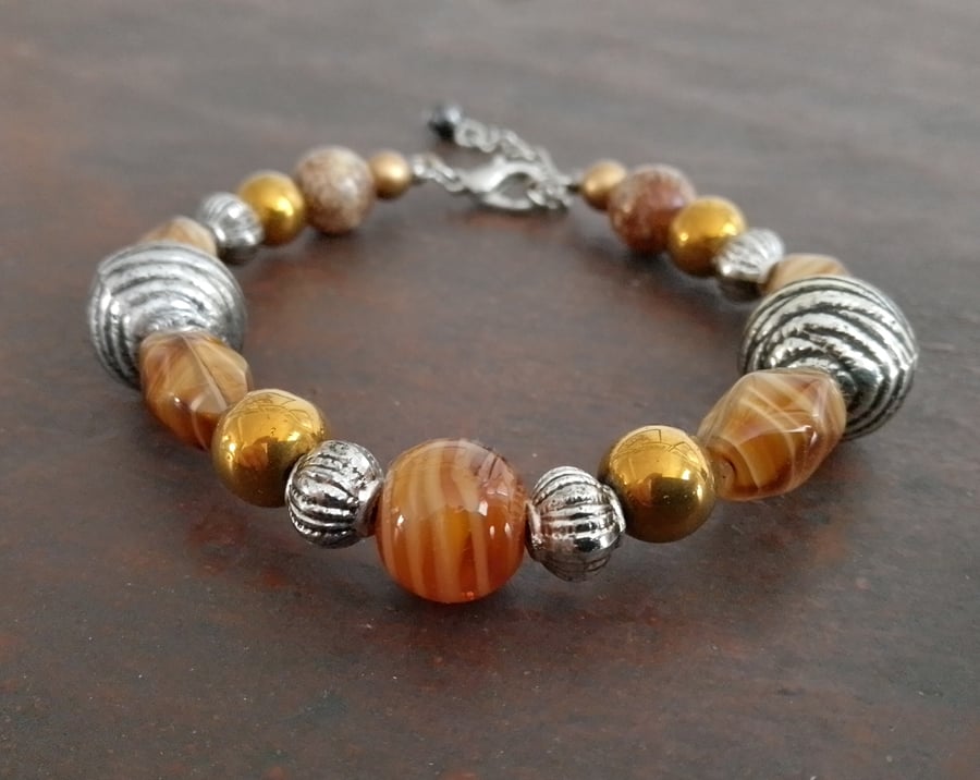 Handmade bracelet made using pre-loved beads.