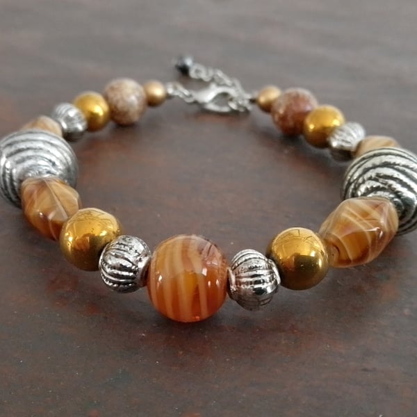 Handmade bracelet made using pre-loved beads.