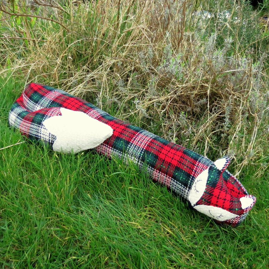 A snoozy fox draught excluder. 34 inches in width. (86cm)