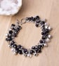  Gemstone Charm bracelet - Stars and jingle bells black bead charm bracelet - Image 1