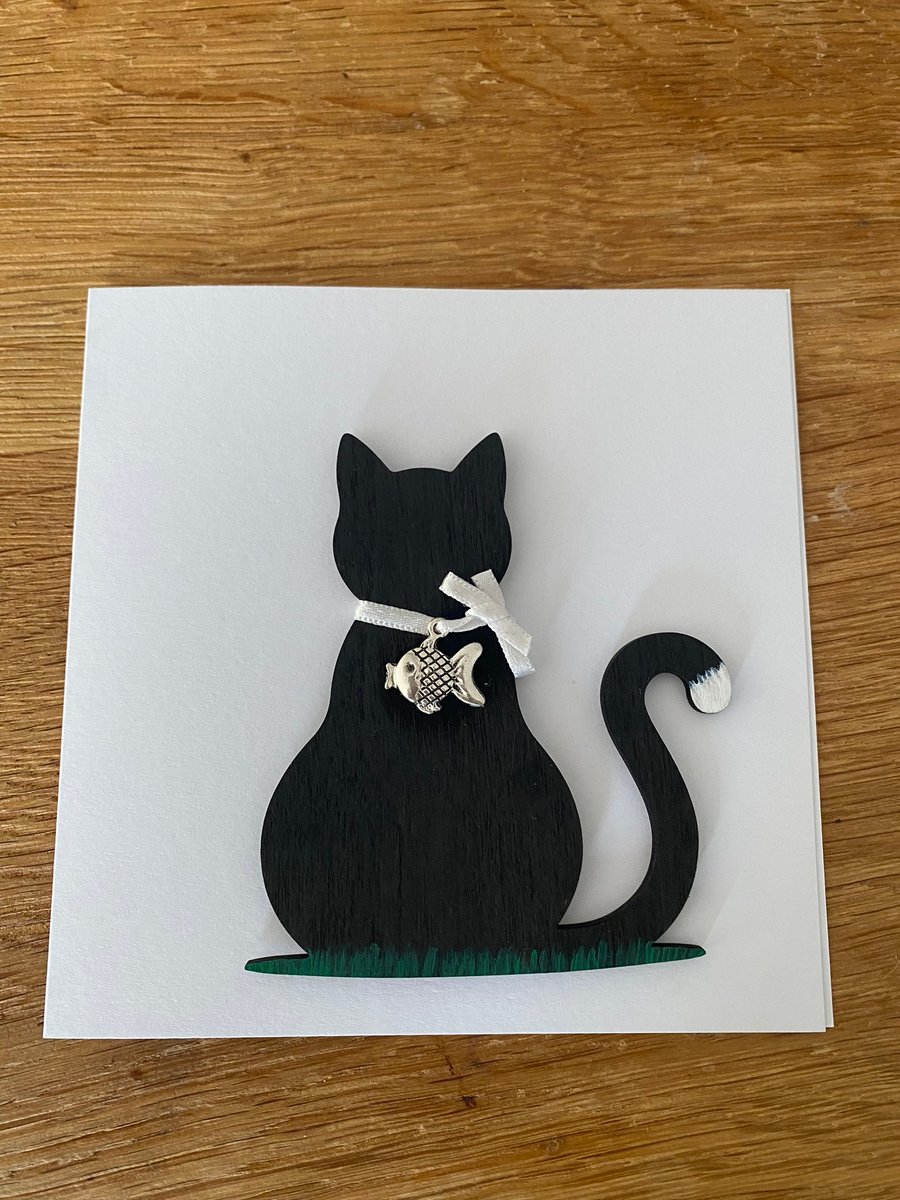 Black cat handmade greetings card wearing a fish charm