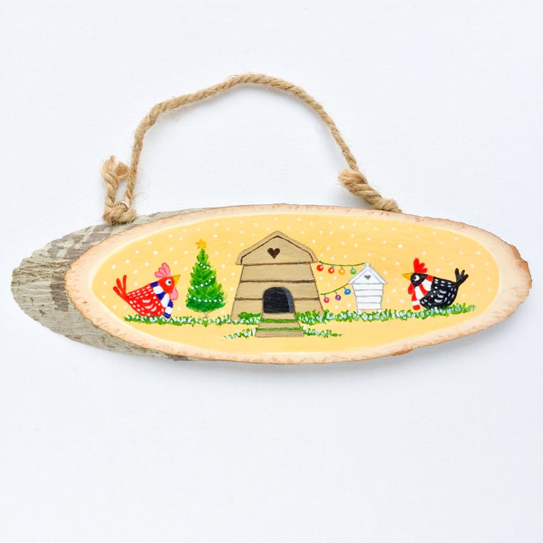 Chatting chickens hanging decoration.