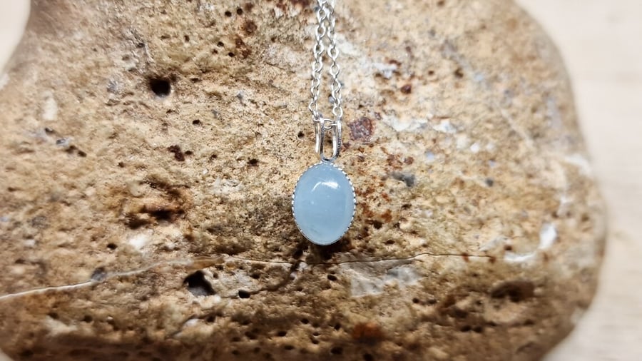 Tiny oval Aquamarine Pendant. March birthstone