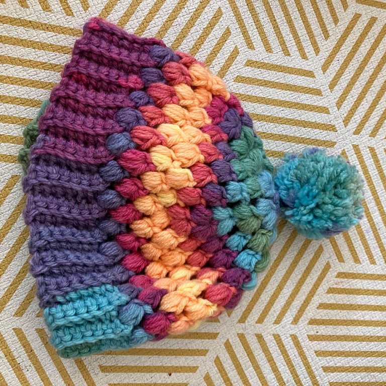 Colourful cosy rainbow Pom Pom bobble hat 