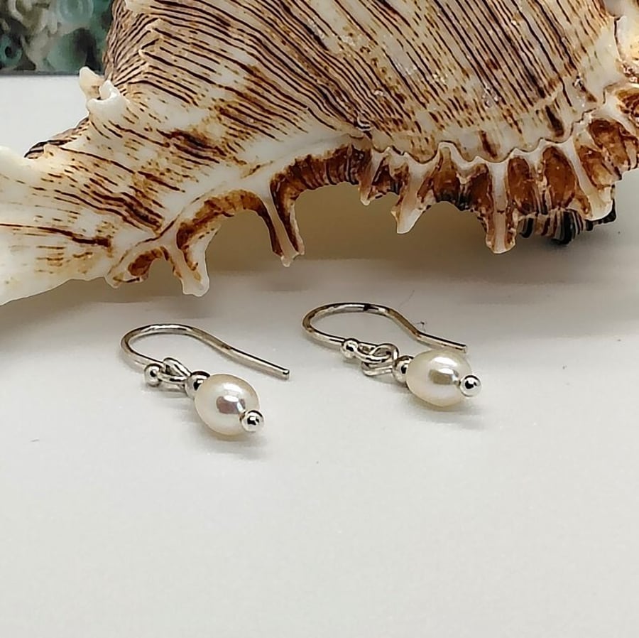 freshwater pearl drop earrings soft white colour sterling silver