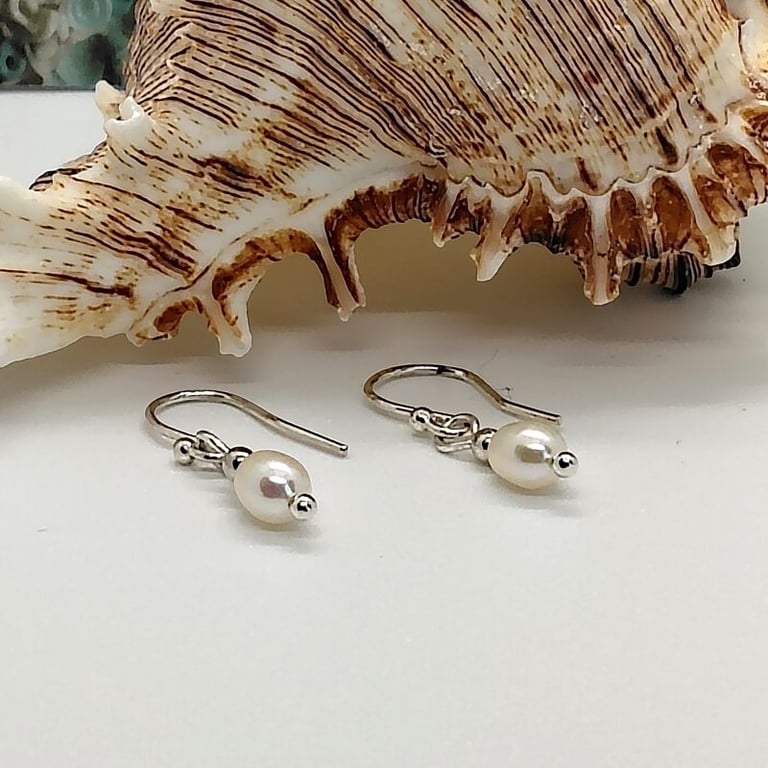 freshwater pearl drop earrings soft white colour sterling silver