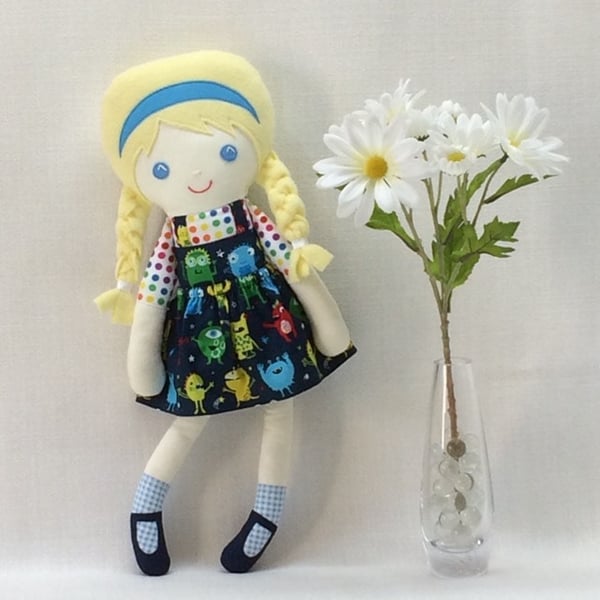 Daisy Doll with monsters on her dress