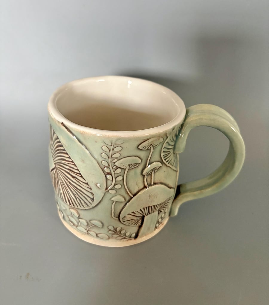 Handmade Ceramic Coffee Mug: Blue Mushroom fungi design