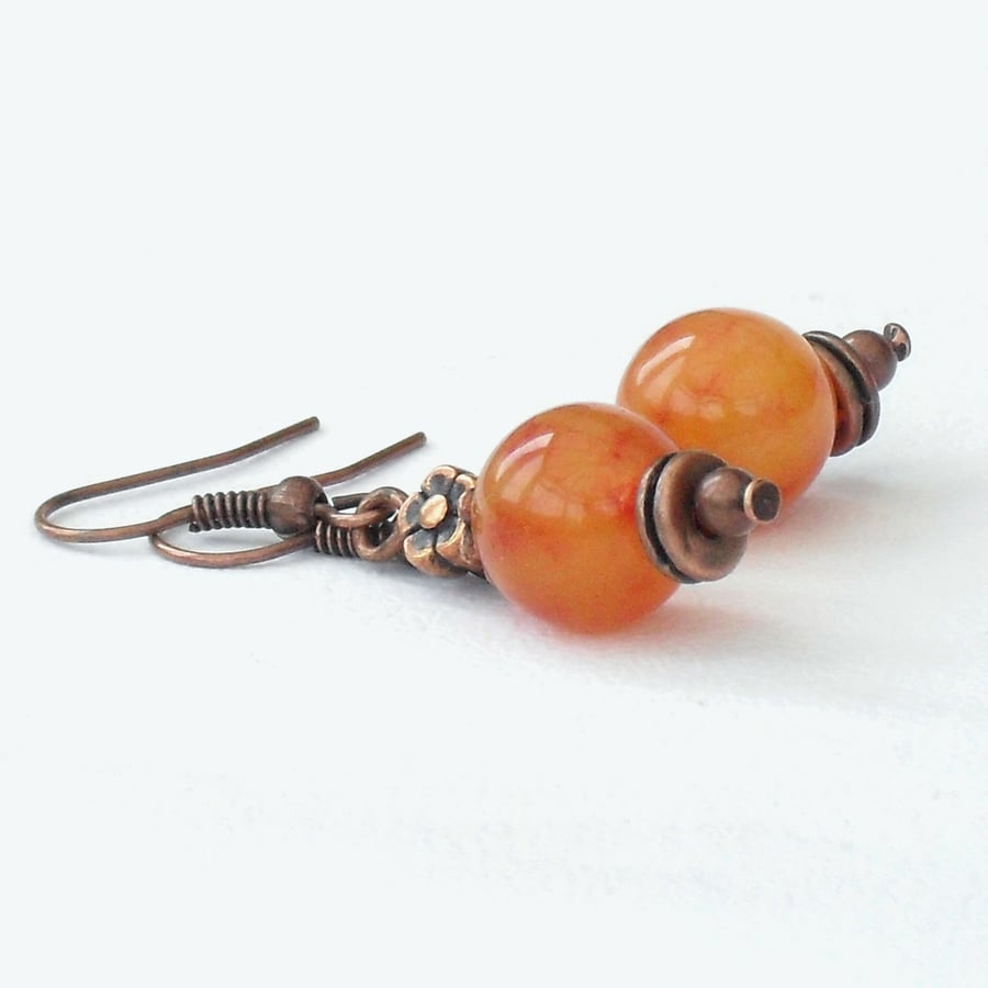 Handmade copper earrings, with orange kunzite