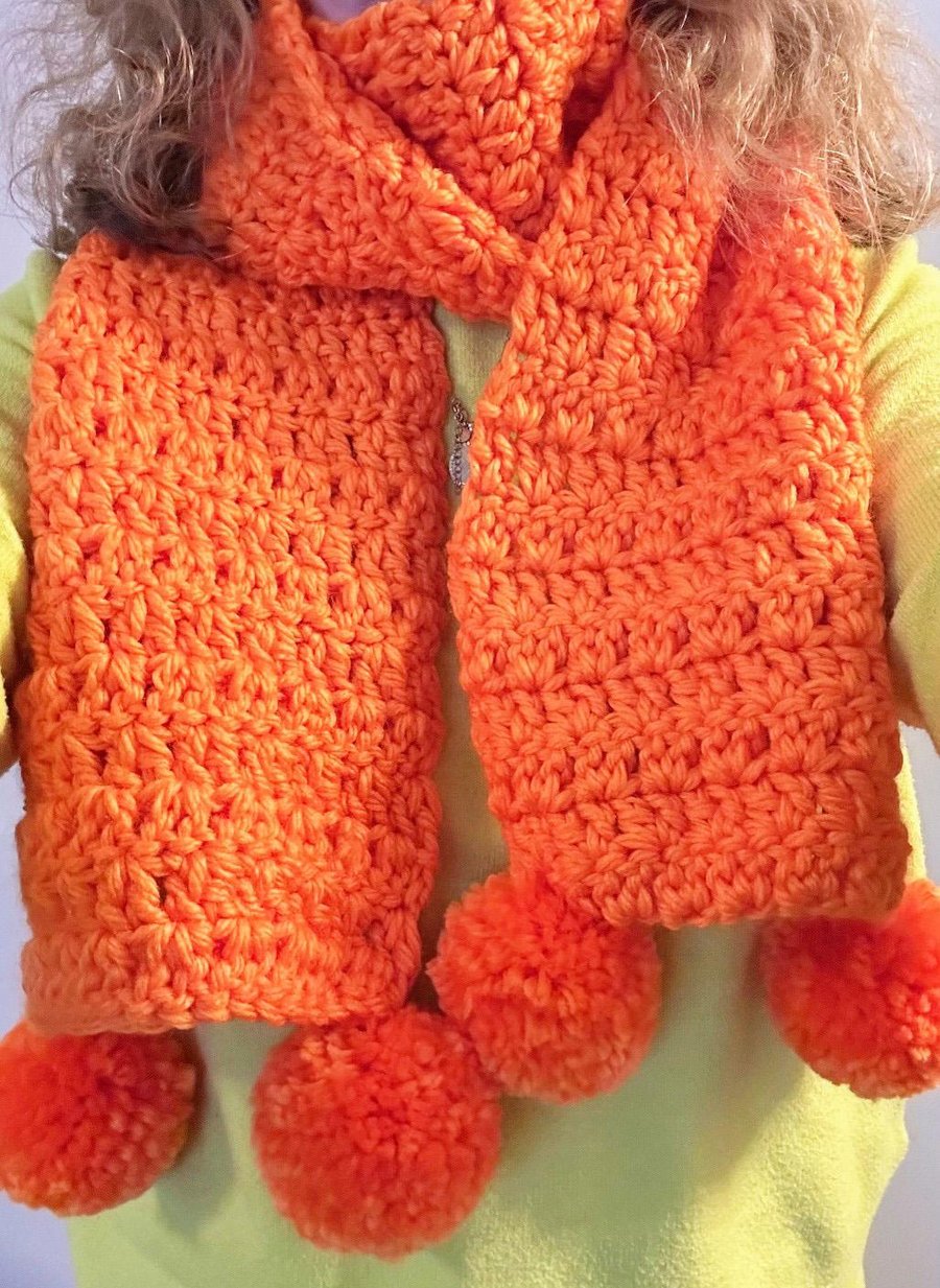 Handmade crocheted chunky knit scarf with pom poms. Various colours