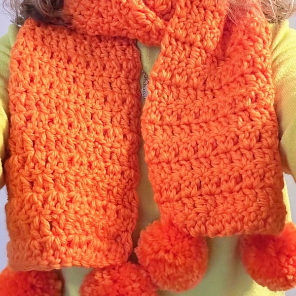 Handmade crocheted chunky knit scarf with pom poms. Various colours