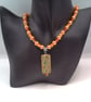 Peach Rectangle with Floral Pattern on an Orange and Peach Necklace & Earrings  - Image 5