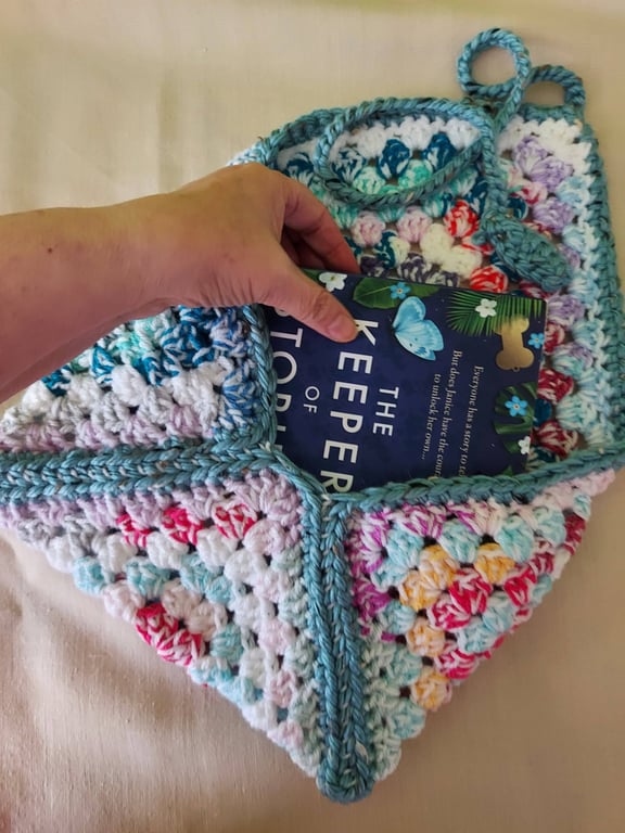 Crocheted book pouch or tablet case, wrap round fastening, multi-coloured