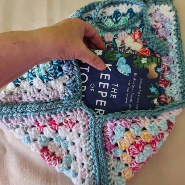 Crocheted book pouch or tablet case, wrap round fastening, multi-coloured