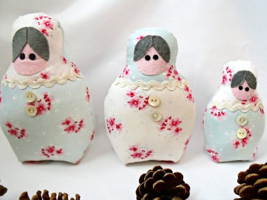 pale green and pink floral graduated russian matryoshka nesting display dolls