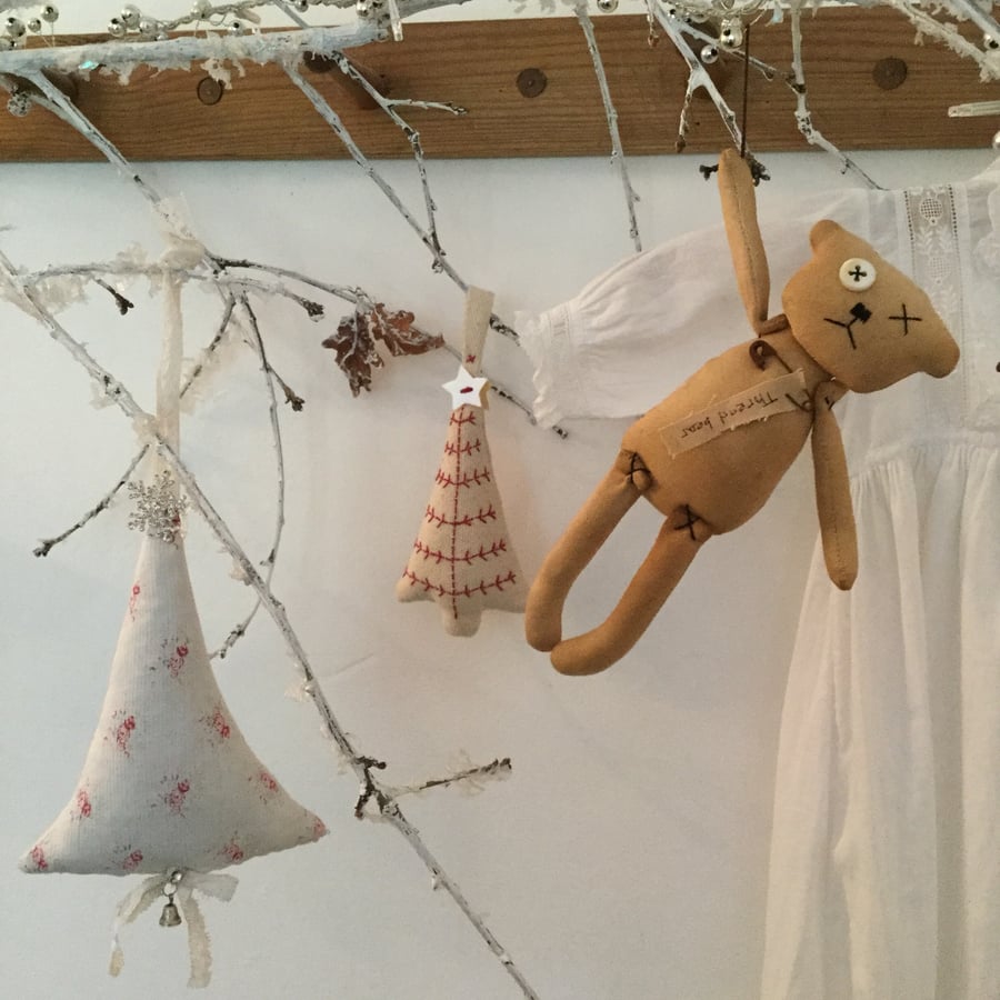 Thread bear with heart patch