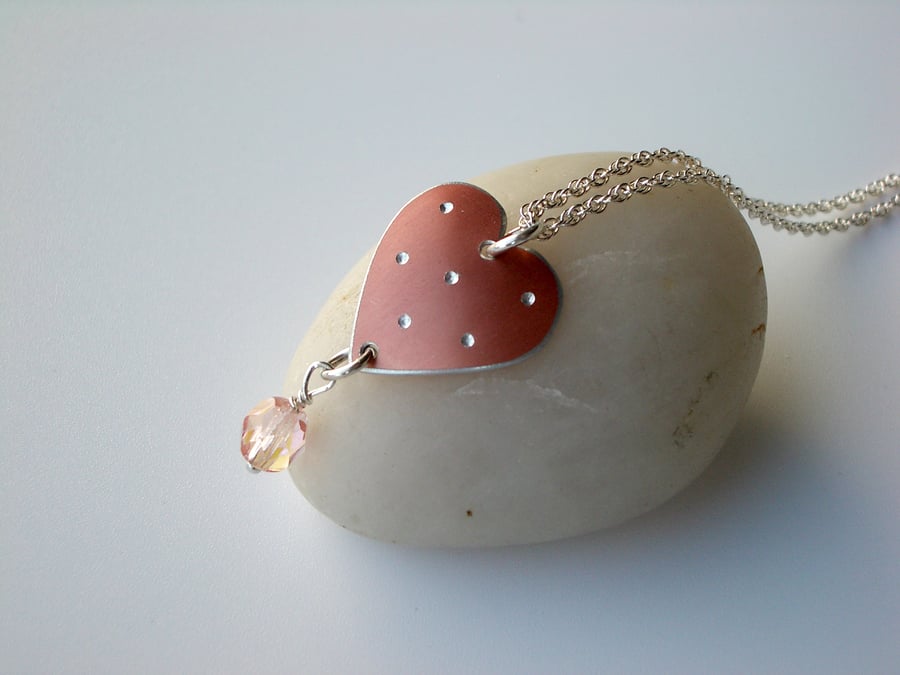 Heart pendant necklace in copper colour with spots