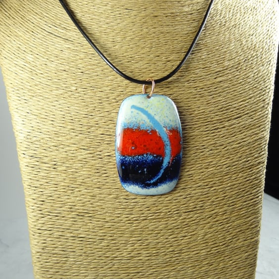 Cream red blue glass enamelled copper pendant on a leather cord 51x34mm (0079)