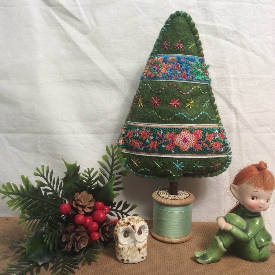 Folk inspired Christmas tree - vintage braid on a pale green bobbin