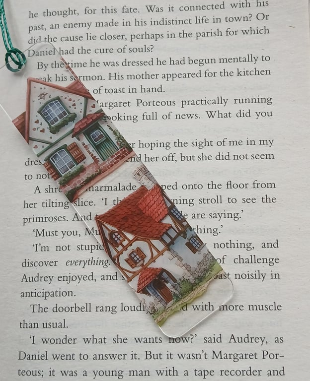 Clear acrylic bookmark decorated with  house decals 