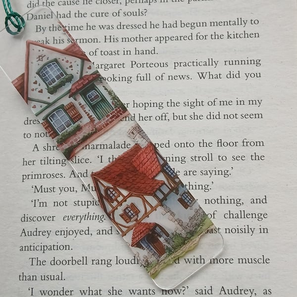 Clear acrylic bookmark decorated with  house decals 