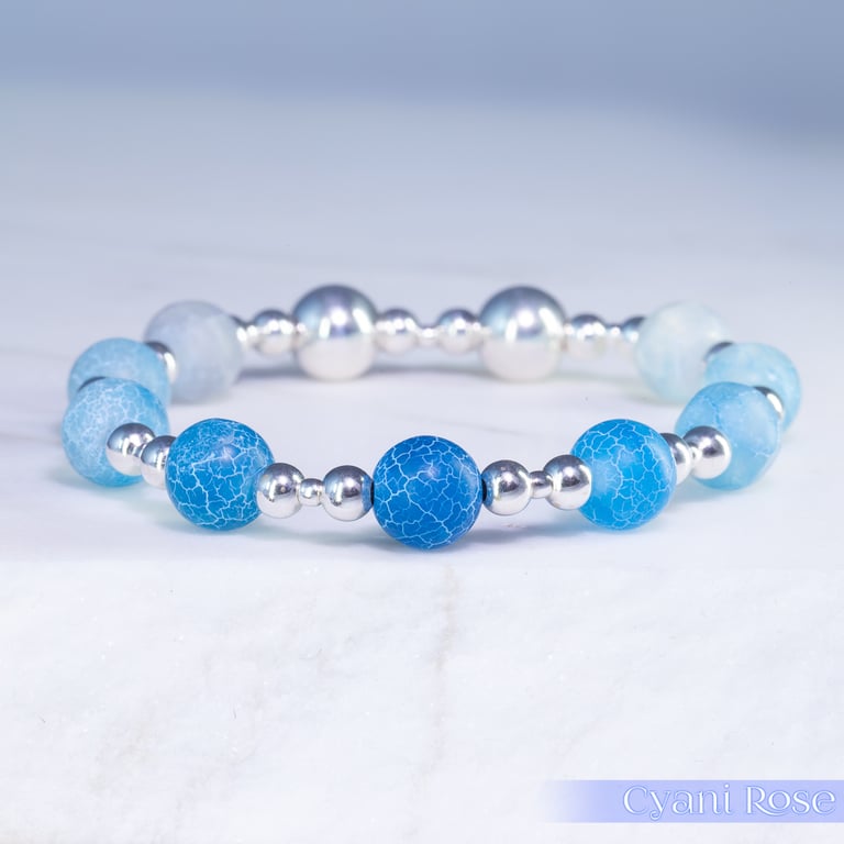 Bracelet sterling silver and crackle glass in blues stretch beaded handmade