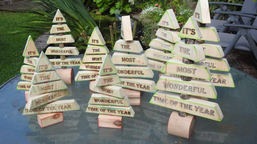 Wooden Christmas tree with the phrase "It's the most wonderful time of the year"