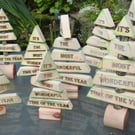 Wooden Christmas tree with the phrase "It's the most wonderful time of the year"