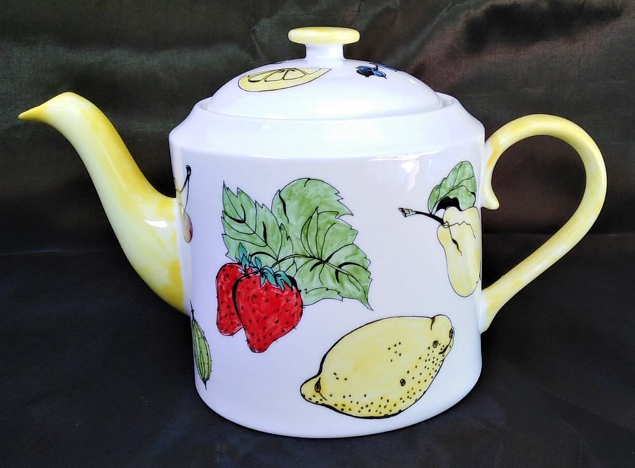 Teapot white bone china six cup hand decorated with fruit and with a yellow spou