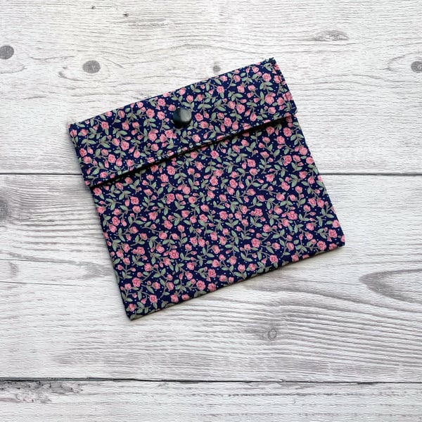 Discreet sanitary pouch. Feminine products holder. Ditsy navy blue and pink.