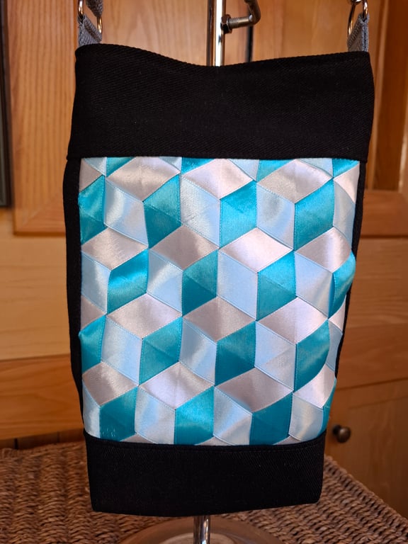 Black denim ribbon weave bag