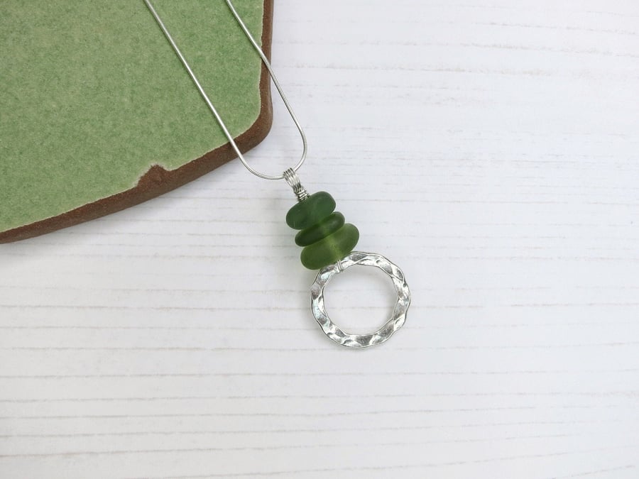 Green Cornish Sea Glass Pendant with a Hammered Silver Circle