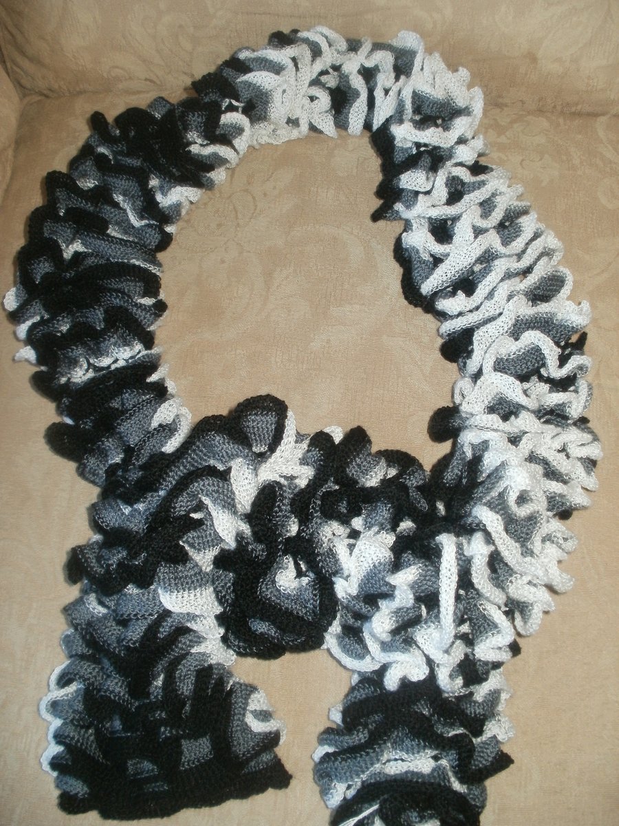 Hand knitted twirl scarf