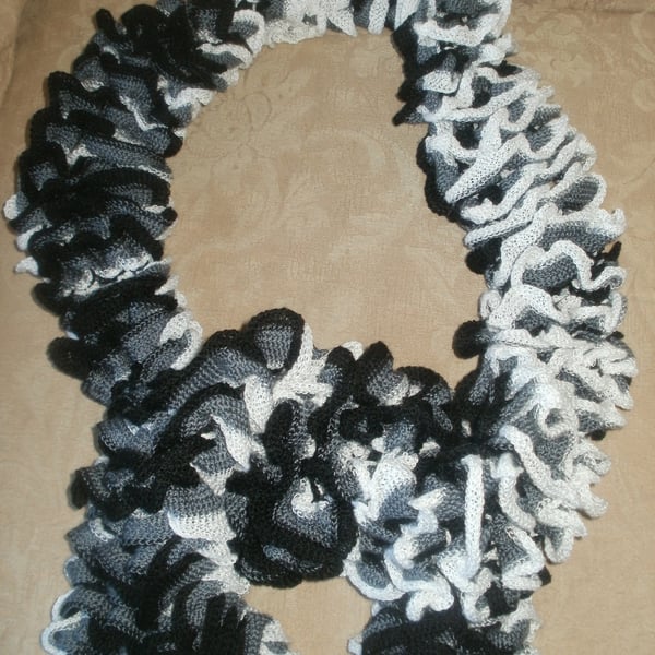 Hand knitted twirl scarf