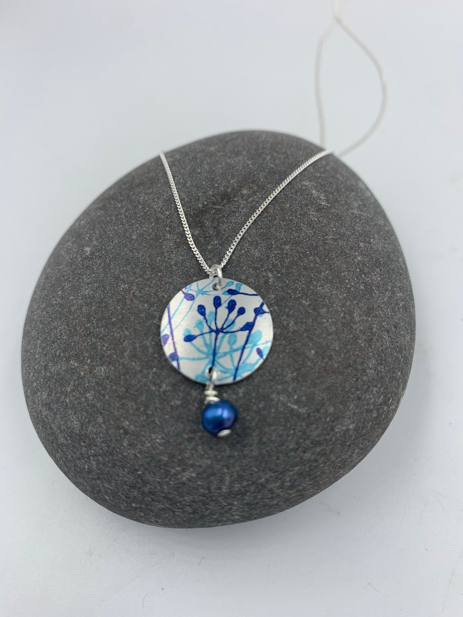 Silver and blue aluminium cow parsley circle pendant with pearl 