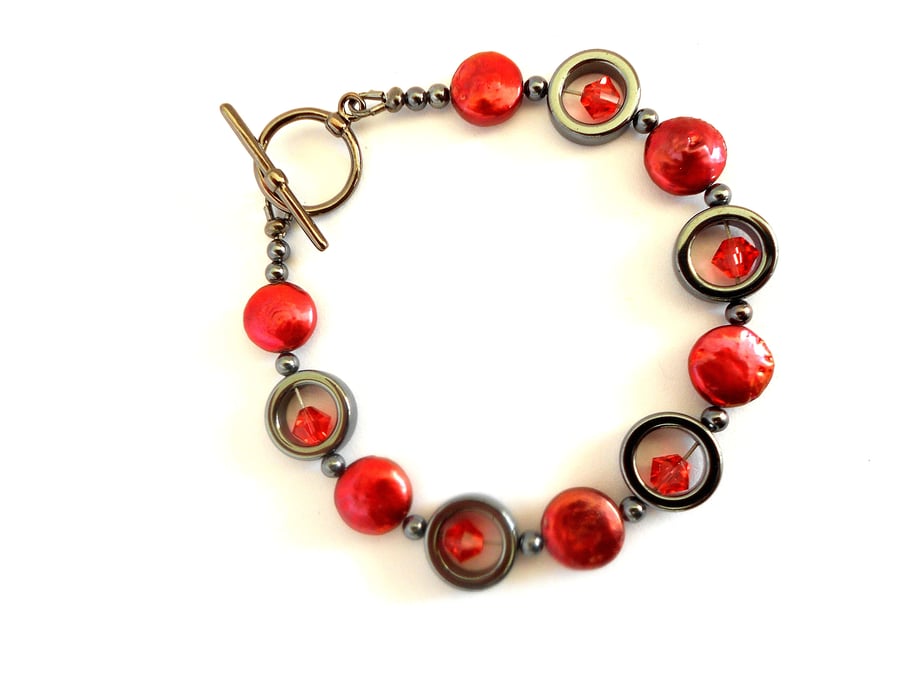 Sale!! was 10 pounds now 8 Freshwater Coin Pearl and Haematite Circles Bracelet.