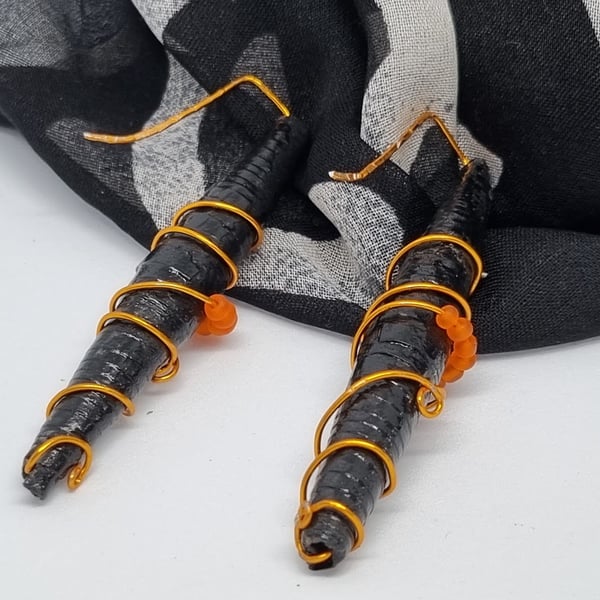 Long black and orange paper and wire earrings