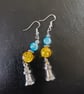 Silver lighthouse charm dangle earrings with yellow and blue beads - Image 6
