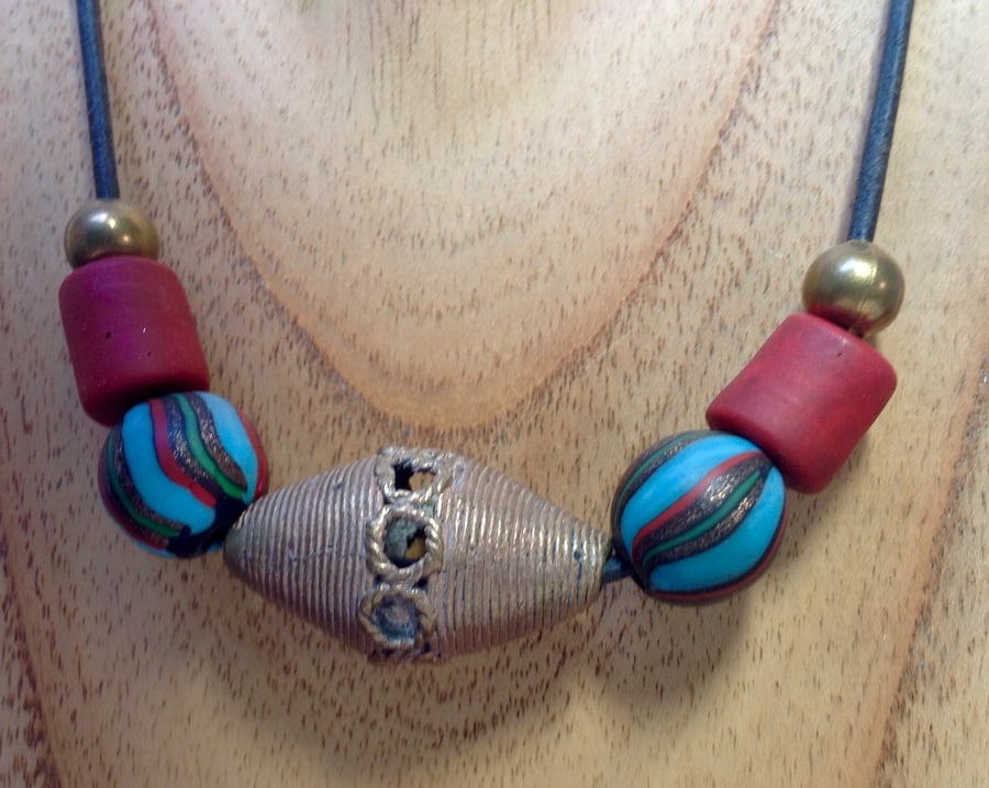 Unisex cord necklace with giant African bronze centre bead