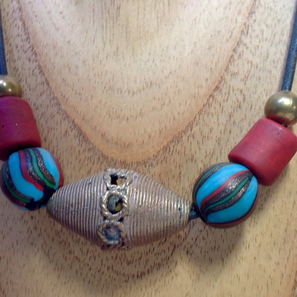 Unisex cord necklace with giant African bronze centre bead