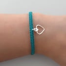 Silver plated macramé heart bracelet with 7 colour options. Ref:434