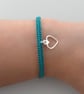 Silver plated macramé heart bracelet with 7 colour options. Ref:434 - Image 1