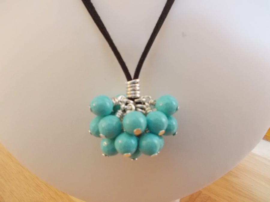 Bright aqua shell cluster pendant