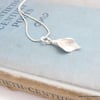 Fine silver arum lily pendant