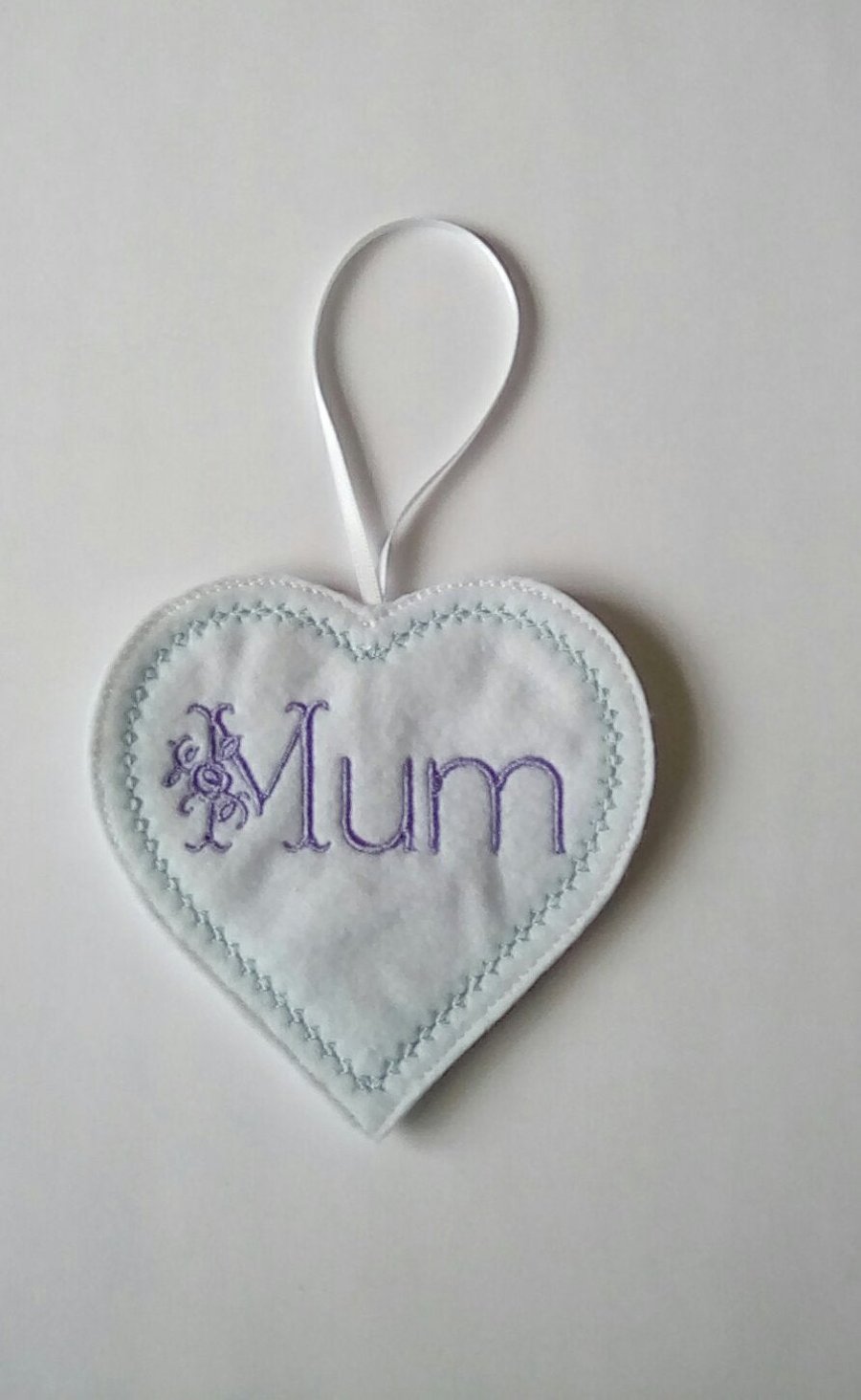 347. Floral mum heart hanging ornament.